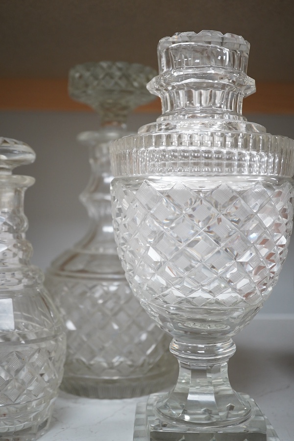 Voneche cut glass - a pair of large decanters, a pair of lidded urns and another decanter, 30cm. Condition- fair to good, several minor chips